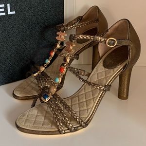 Hold Chanel gold gems sandal heels
